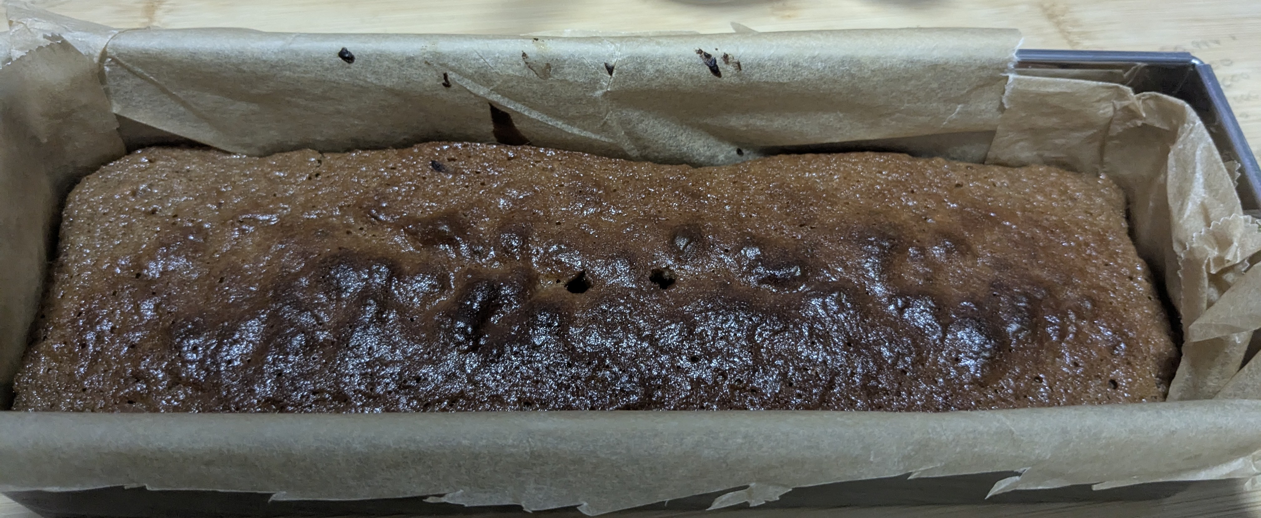 A beautiful chocolate pound cake in a loaf pan